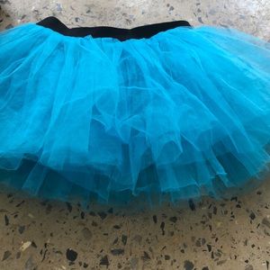 A blue gone for a run running Tutu